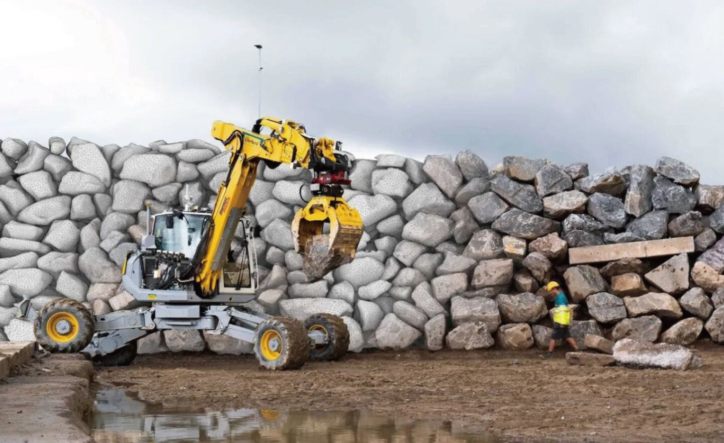 搭載 AI 人工智慧的無人自動挖土機建造 65.5 公尺的擋土牆